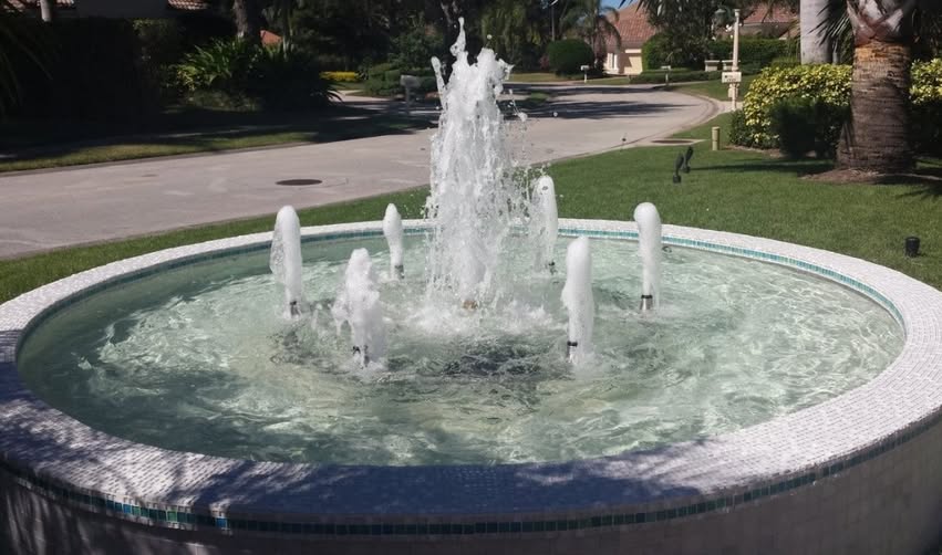 Frothy nozzle spray ring