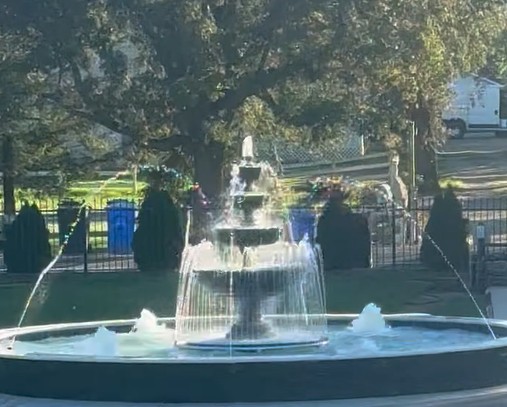 Concrete fountain enhanced with a spray ring